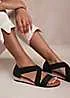 Where’s That From Hummingbird Low Wedge Sandals with Cross Over Strap in Black Suede